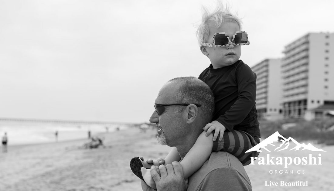 Grandparent carrying grandchild on shoulders demonstrating strength, mobility, and vitality across generations