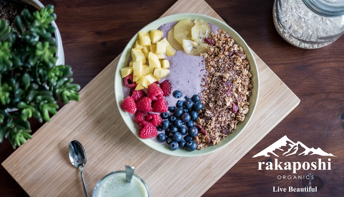 Bowl of probiotic yogurt with fresh berries and granola representing gut-healthy fermented foods and nutrition