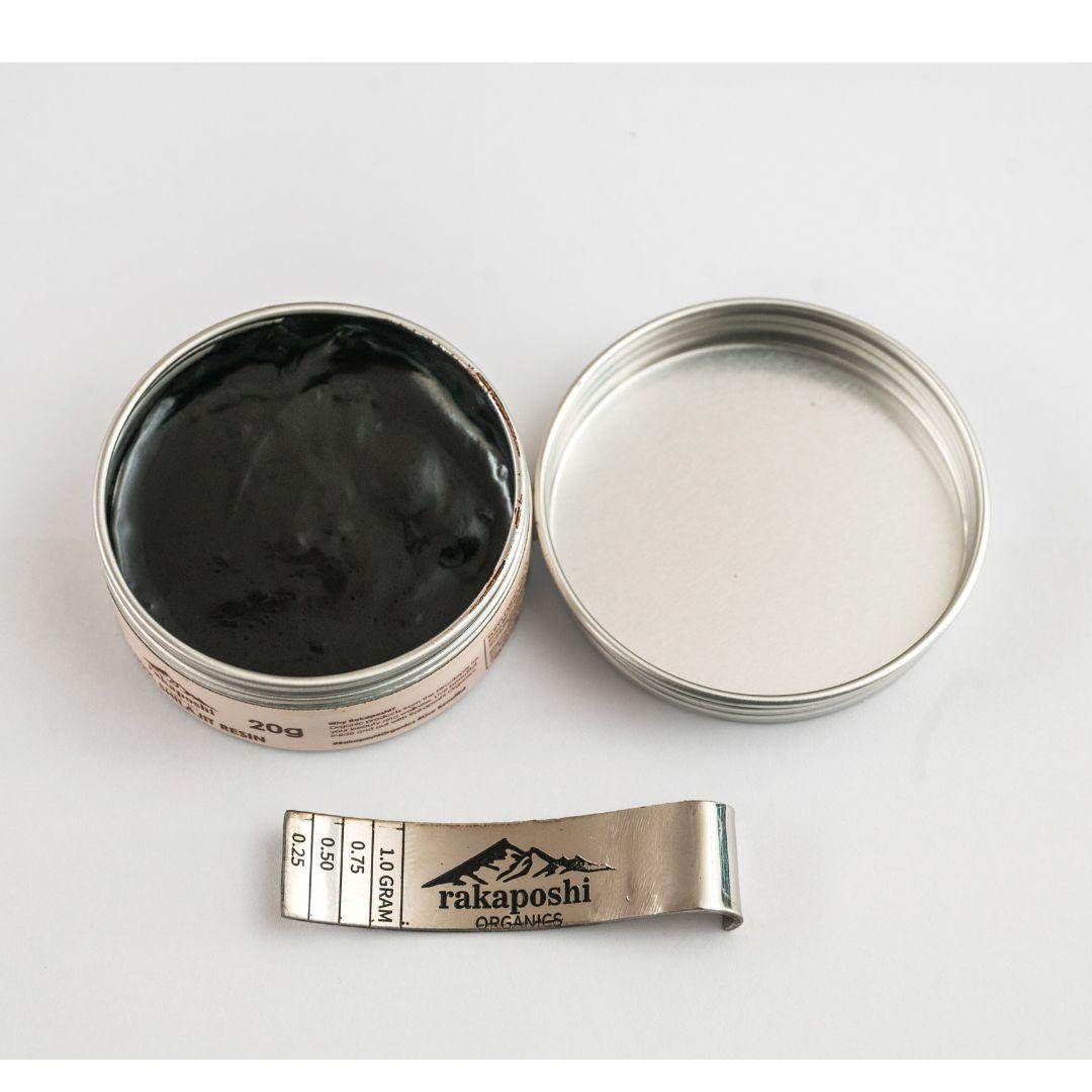 Jar of pure premium sundried Himalayan Shilajit Resin showing its thick and rich texture in sustainable packaging