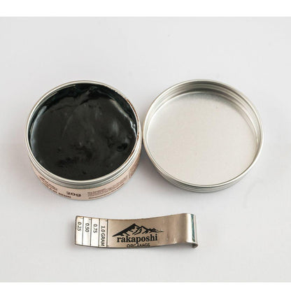 Jar of pure premium sundried Himalayan Shilajit Resin showing its thick and rich texture in sustainable packaging